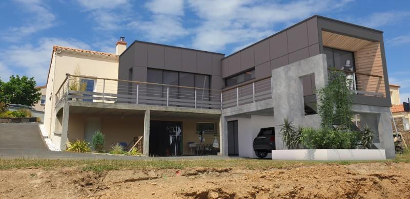 Extension contemporaine d'une maison à Oudon