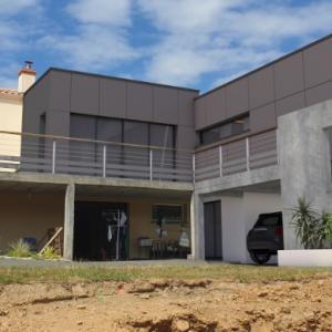 Extension contemporaine d'une maison à Oudon