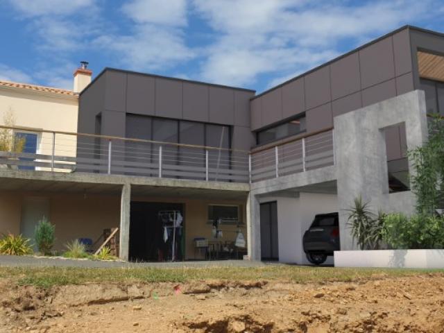 Extension contemporaine d'une maison à Oudon